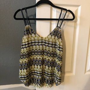 Fun pattern tank blouse with faux leather straps!